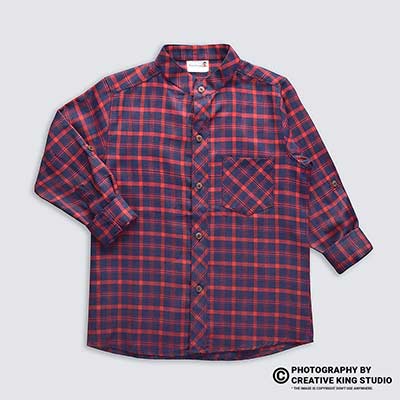 Ckstudio shot of red and navy plaid shirt on light gray background, Commercial Product Photography