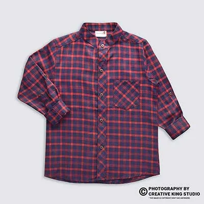 Ckstudio shot of red and navy plaid shirt on light gray background, Commercial Product Photography