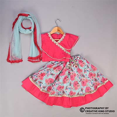 Ckstudio shot of floral skirt and pink blouse with matching scarf on gray background — Commercial Product Photography