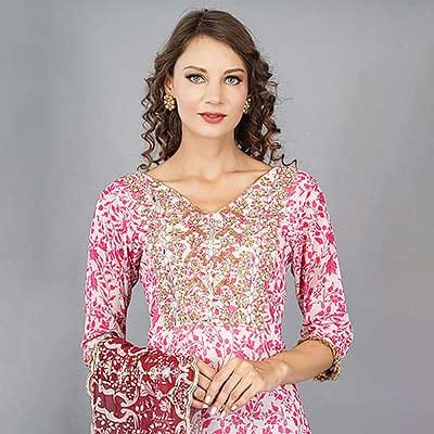 Ckstudio shot of model wearing pink embroidered apparel on gray background, Commercial Product Photography