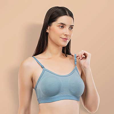 Shot of model wearing blue lingerie on beige background — Ckstudio; E-Commerce Photography