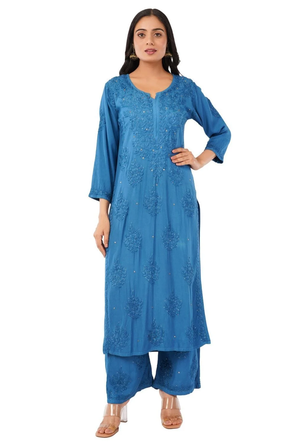 Model in a blue embroidered kurta and palazzo set photographed full length on a pure white background for a marketplace fashion listing