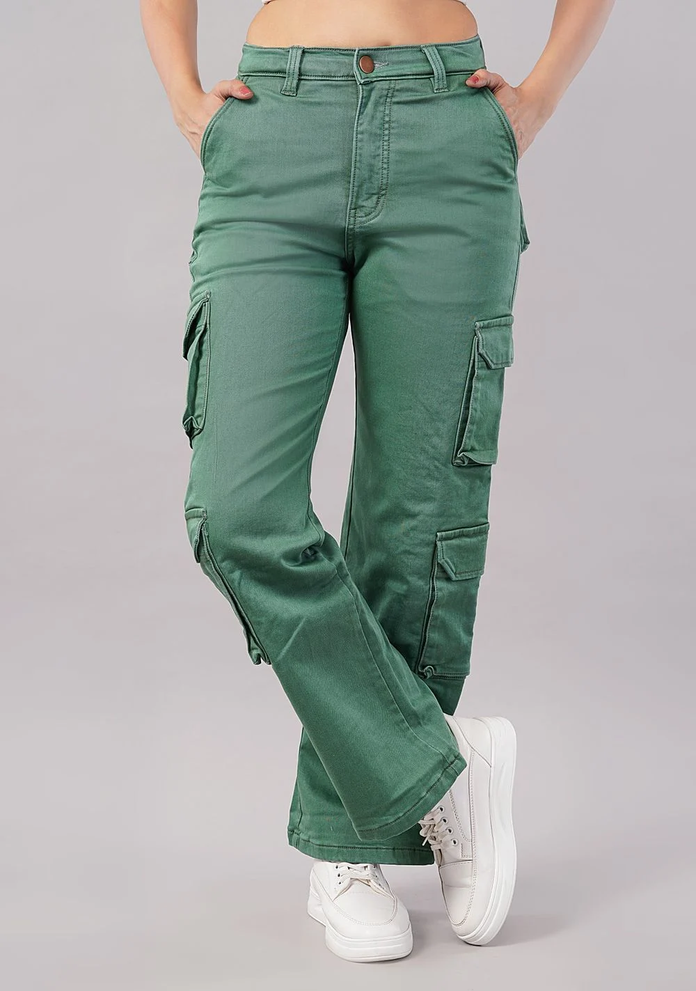 Green cargo pants on a model cropped from waist to shoes on a light grey background, showing tight frame fill for a bottomwear listing