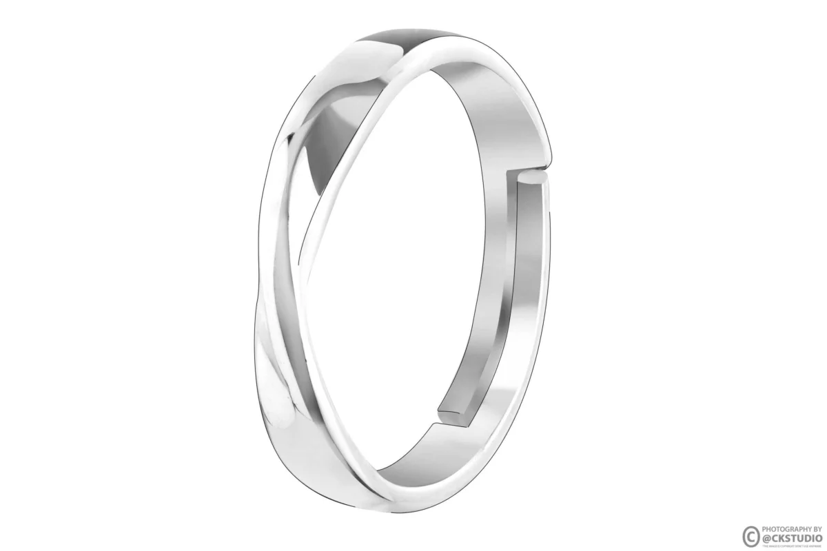 Silver twisted band ring photographed upright on a pure white background with a soft grounding shadow, filling most of the frame as a marketplace main image