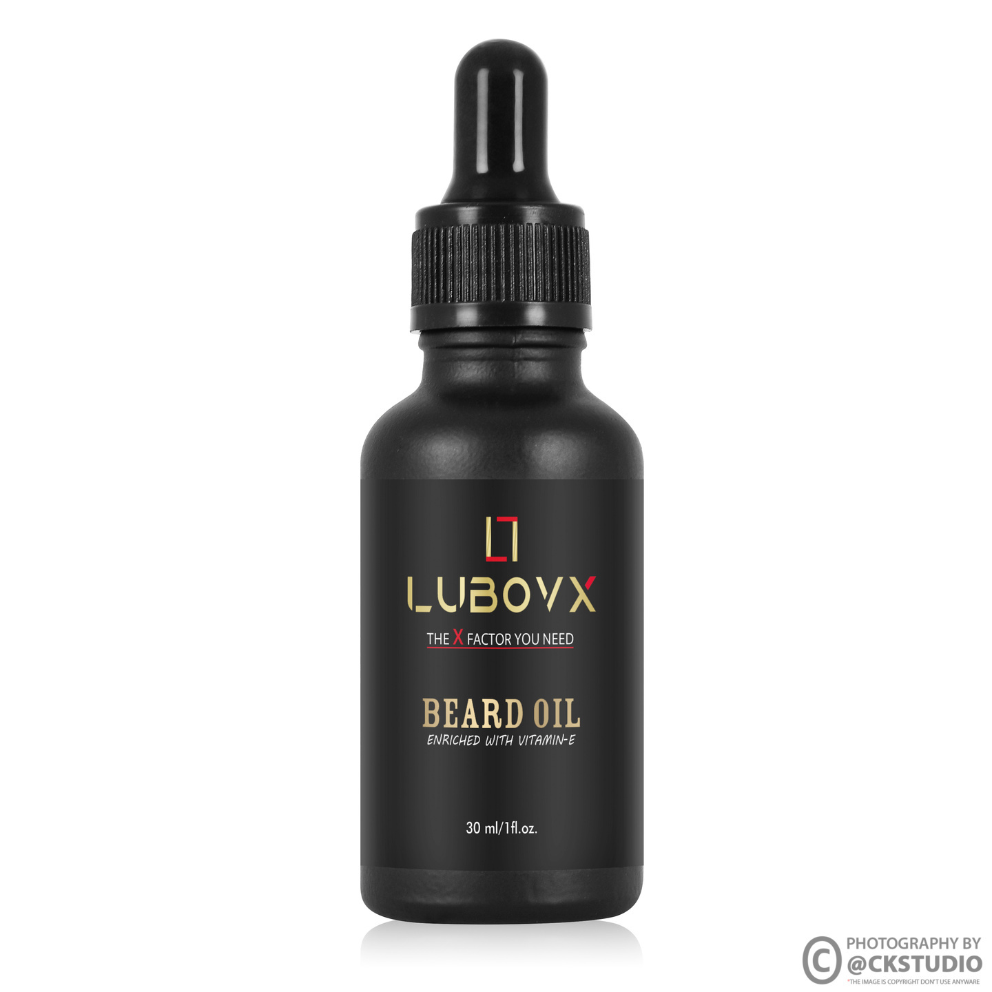Black beard oil dropper bottle product photography on white background