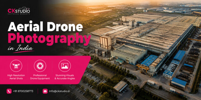 Aerial drone photography in India showing a large industrial manufacturing plant during golden hour with factory infrastructure, logistics yards, and professional drone imaging services by CKStudio.
