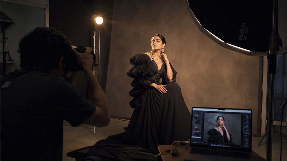 Editorial style fashion photography featuring Indian model in avant-garde couture, cinematic dramatic studio lighting, painterly composition, Vogue India magazine aesthetic, Delhi NCR editorial trend 2026 shot at Ckstudio