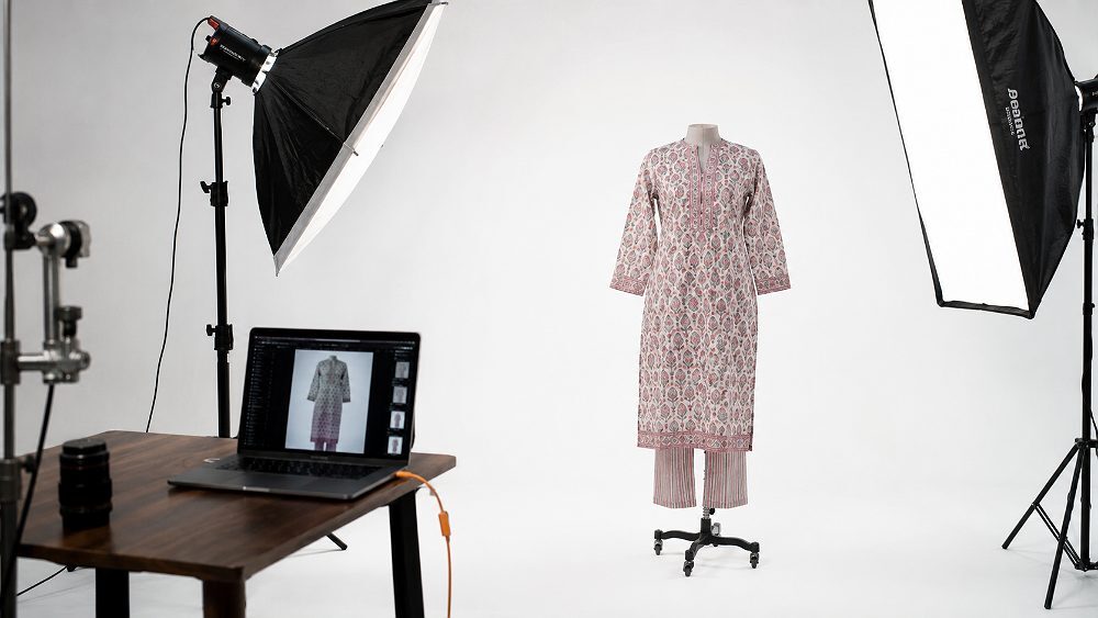 Behind the scenes of clean ecommerce product photography ghost mannequin setup with printed cotton kurta on invisible