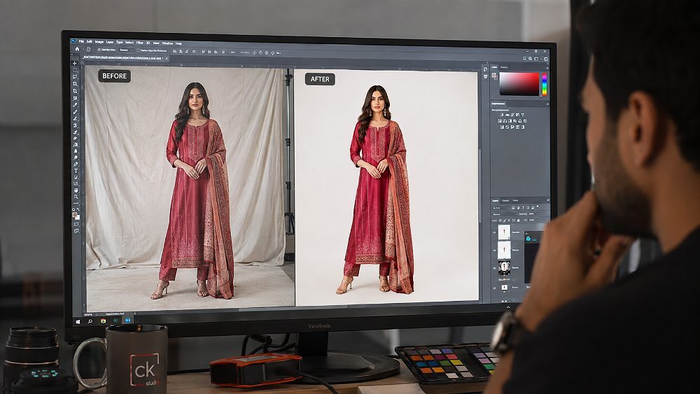 Post-production retouching stage of Fashion Catalogue Shoot at Indian standard ecommerce photography studio showing split-screen before-and-after view on colour-calibrated monitor with left side raw frame of model in ethnic kurta and right side finished retouched version featuring cleaned background, corrected skin tone, garment fold correction and colour-graded output ready for Myntra Ajio Amazon marketplace listing