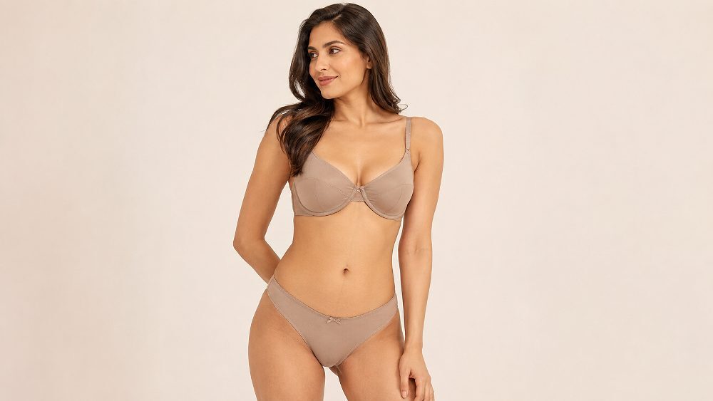 Behind the scenes of tasteful lingerie ecommerce fit-reference photograph of a real adult Indian female model wearing a