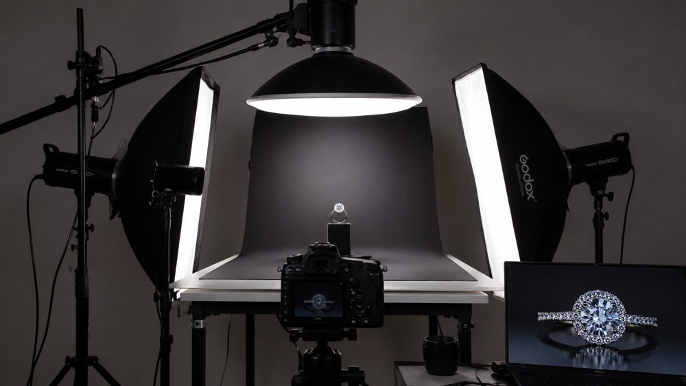 Professional jewellery photography lighting setup showcasing a diamond ring under multi-point studio lights at Ckstudio Delhi NCR