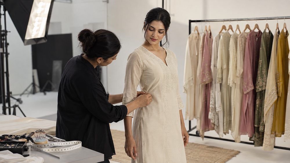 Behind the scenes of behind-the-scenes pre-shoot fitting session inside an Indian standard ecommerce photography studio