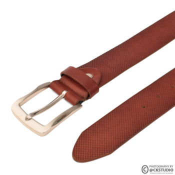 Ckstudio shot of a textured brown belt on a white background — Commercial Product Photography.