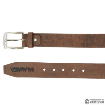Ckstudio shot of a brown leather belt on a clean white background — Commercial Product Photography.