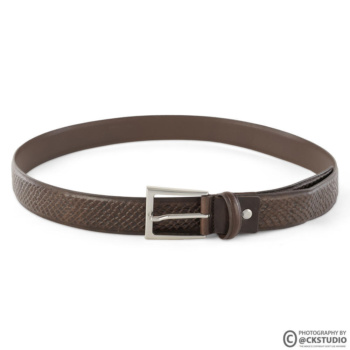 Ckstudio shot of a textured brown belt on a clean white background — Commercial Product Photography.