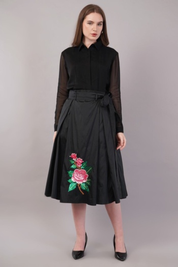 B model wearing black blouse and floral skirt, studio background, Commercial Product Photography shot — Ckstudio