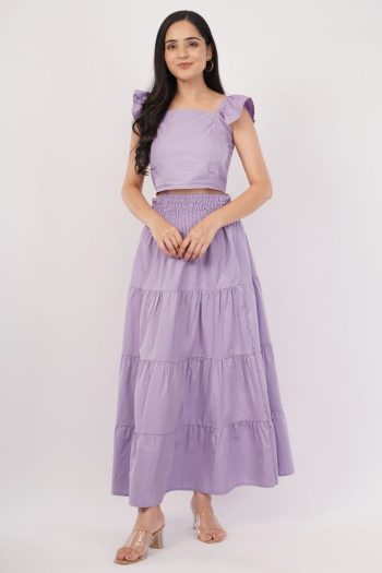 Shot of woman wearing lavender two-piece outfit on white background — Ckstudio Commercial Product Photography