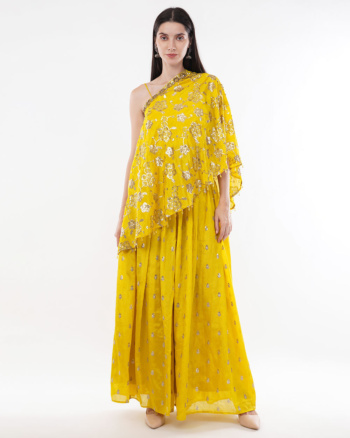 B) model wearing yellow embellished ethnic outfit, shot on white background — Ckstudio; Commercial Product Photography