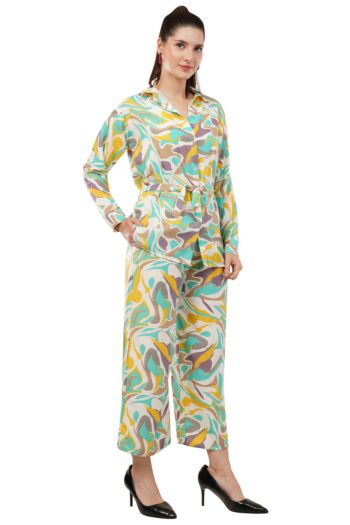 B) model wearing colorful patterned pantsuit, shot on white background — Ckstudio, Commercial Product Photography