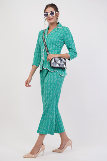 Shot of model wearing green patterned apparel on white background — Ckstudio Commercial Product Photography