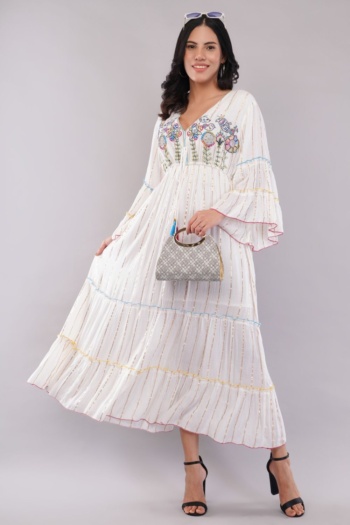 B model wearing embroidered white dress, holding handbag, on gray background, Fashion Photography shot — Ckstudio