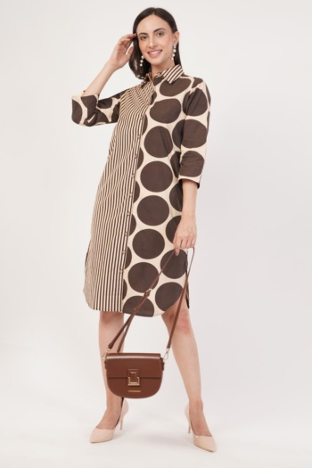 Ckstudio shot of model wearing patterned dress and holding brown handbag on white background, E-Commerce Photography