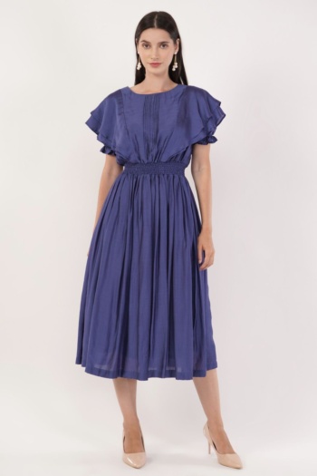 B) model wearing blue midi dress, shot on white background — Ckstudio, Garment Photography