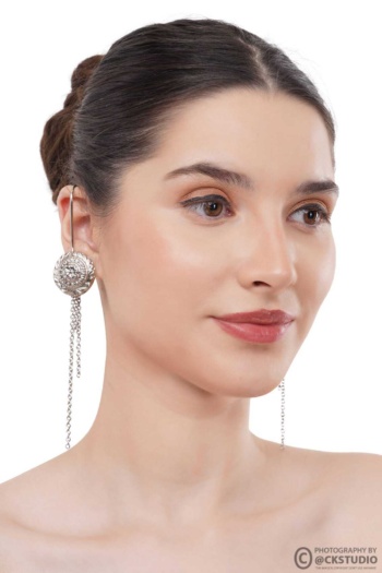 Shot of silver dangling earrings on model with white background — Ckstudio, Jewellery Photography