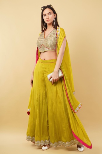 Shot of model wearing yellow ethnic apparel on beige background — Ckstudio Commercial Product Photography