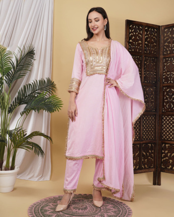 Ckstudio shot of model wearing pink embellished ethnic apparel on beige background, Commercial Product Photography