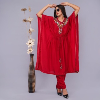Burgundy embroidered kaftan with matching pants on gray background, Commercial Product Photography shot — Ckstudio