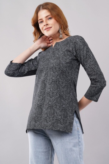 Shot of model wearing printed top on light gray background — Ckstudio Commercial Product Photography