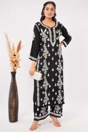 Shot of model wearing black and white embroidered kurta set on white background, Commercial Product Photography — Ckstudio