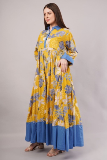 Shot of model wearing yellow and blue floral dress on gray background — Ckstudio Commercial Product Photography