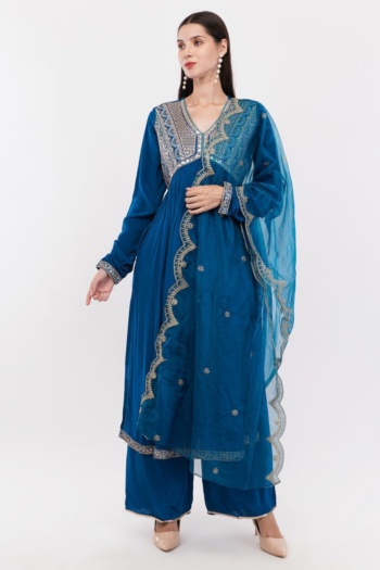 Shot of model wearing blue embroidered ethnic apparel on white background — Ckstudio Commercial Product Photography