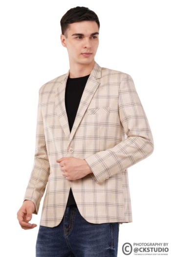 B model wearing beige checkered blazer and black shirt, shot on white background, Fashion Photography — Ckstudio