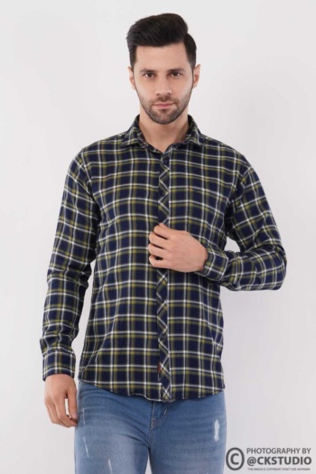 Shot of male model wearing checkered shirt on white background — Ckstudio Fashion Photography