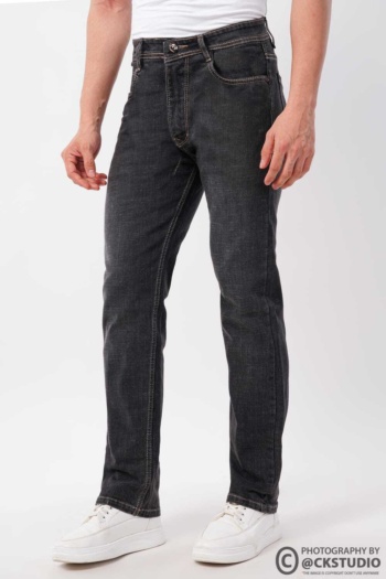 Shot of black denim jeans on white background — Ckstudio, Fashion Photography