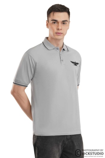 Shot of male model wearing grey polo shirt on white background — Ckstudio Fashion Photography