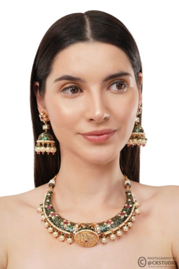 Shot of model wearing traditional necklace and earrings on white background — Ckstudio Jewellery Photography