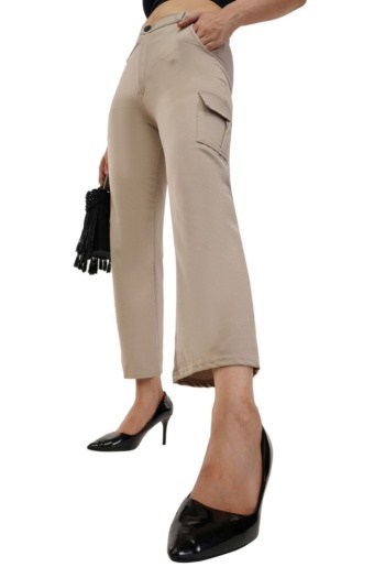 Ckstudio shot of beige cargo pants worn by model on white background — Garment Photography