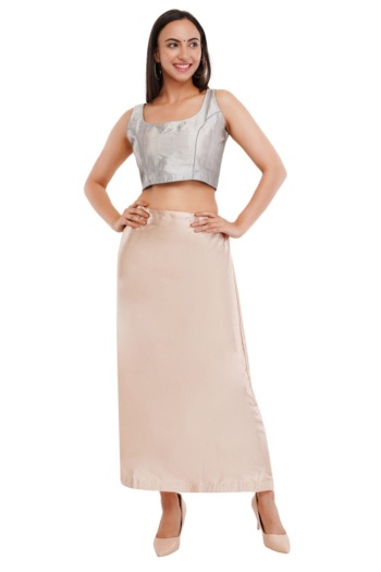 B) model wearing silver crop top and beige skirt, shot on white background — Ckstudio, Garment Photography