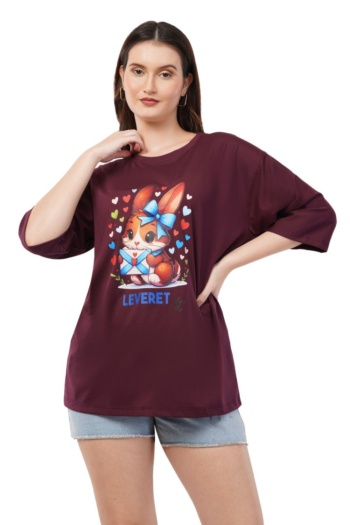 Burgundy t-shirt with cartoon bunny print on white background, model wearing denim shorts shot — Ckstudio E-Commerce Photography