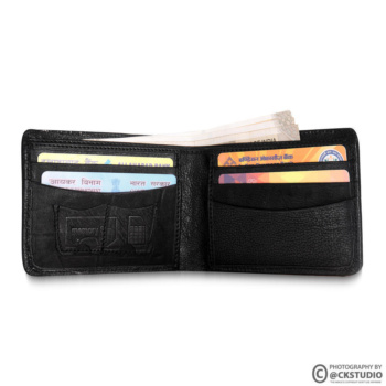 Ckstudio shot of a black wallet with cards and cash on a white background — Commercial Product Photography.