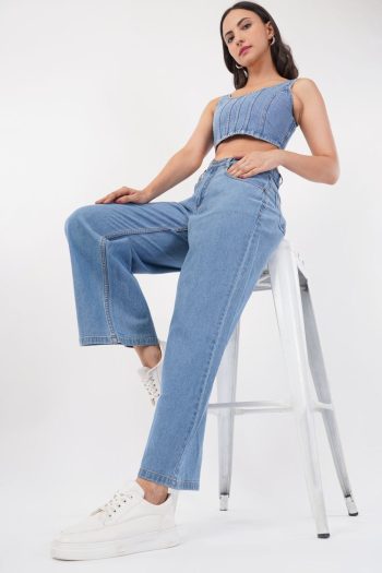 Shot of model wearing denim crop top and jeans on white background — Ckstudio, E-Commerce Photography