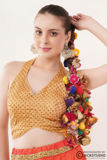 Ckstudio shot of model wearing traditional attire on plain white background — Model Photography